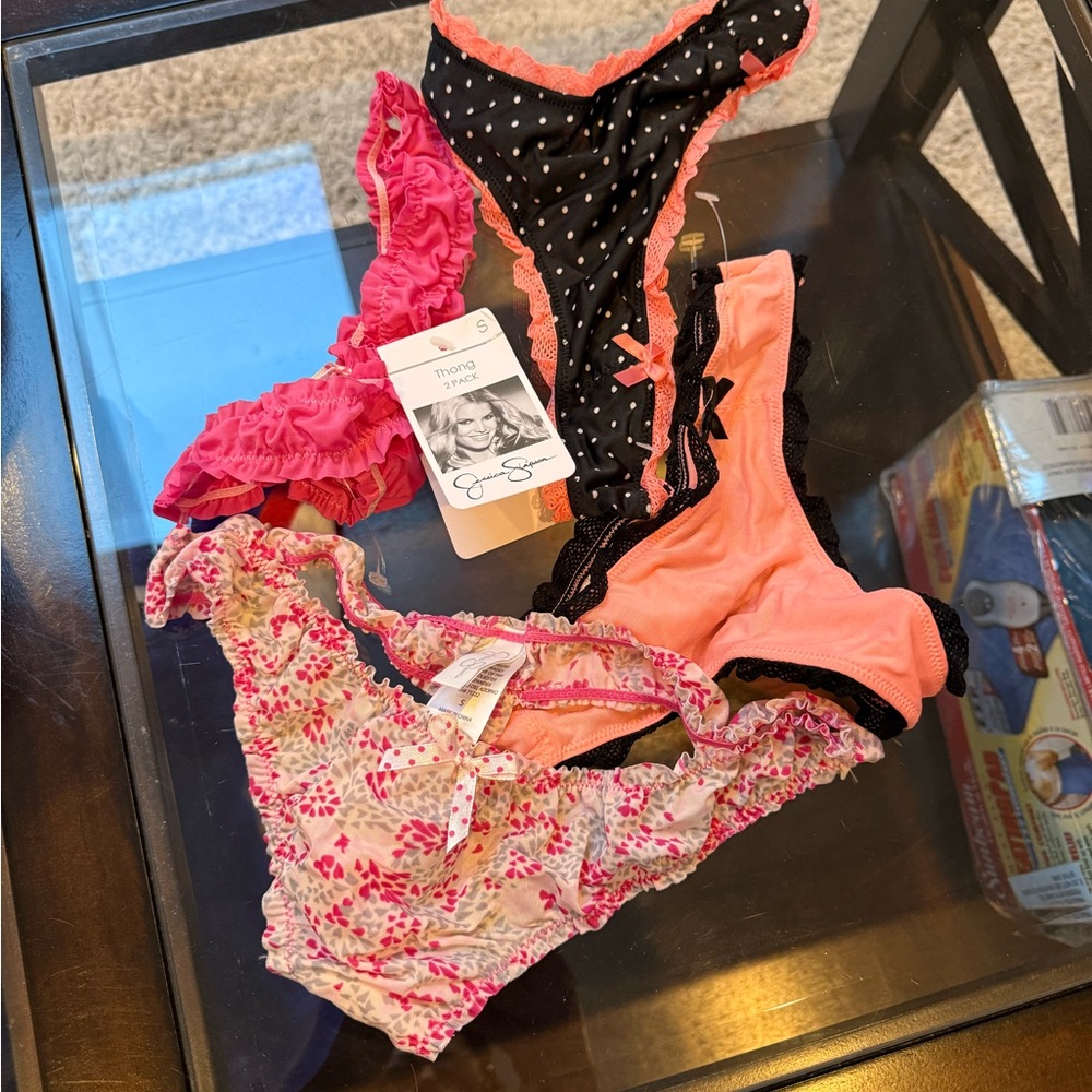 Women’s new with tags 4 pack thong Panties - Pink, Coral & Black Polka Dot